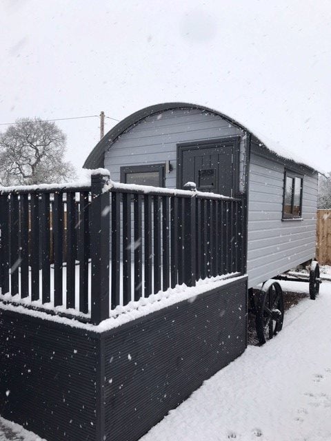 The hut and deck in the snow